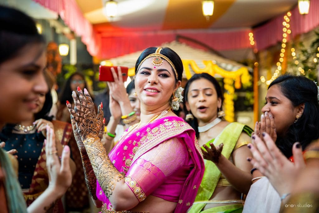 mehendi function bride dancing